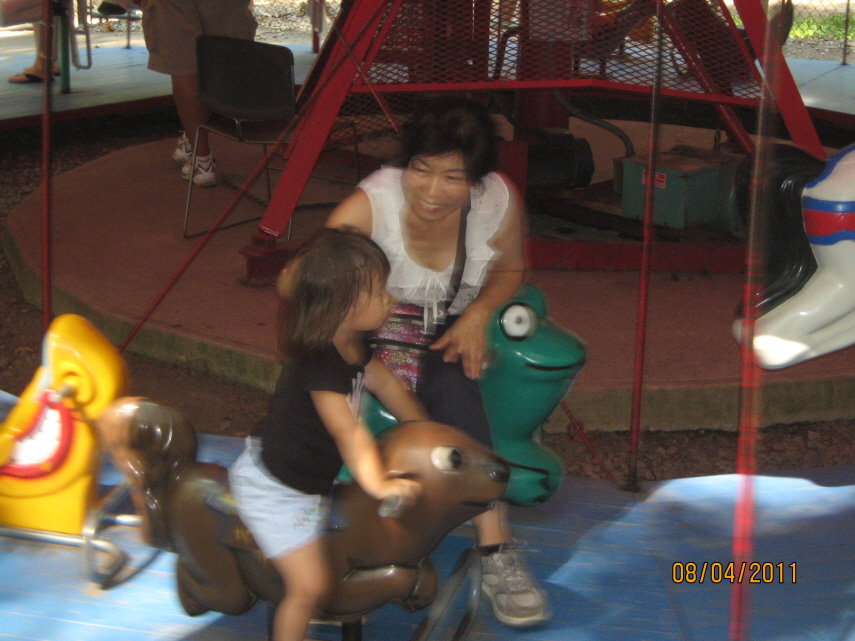 Photo Editor_110804p Karis n mj at Burke Lake Carousel.JPG : Aug 1 at Home Pool and Aug 4 at Burke Lake
