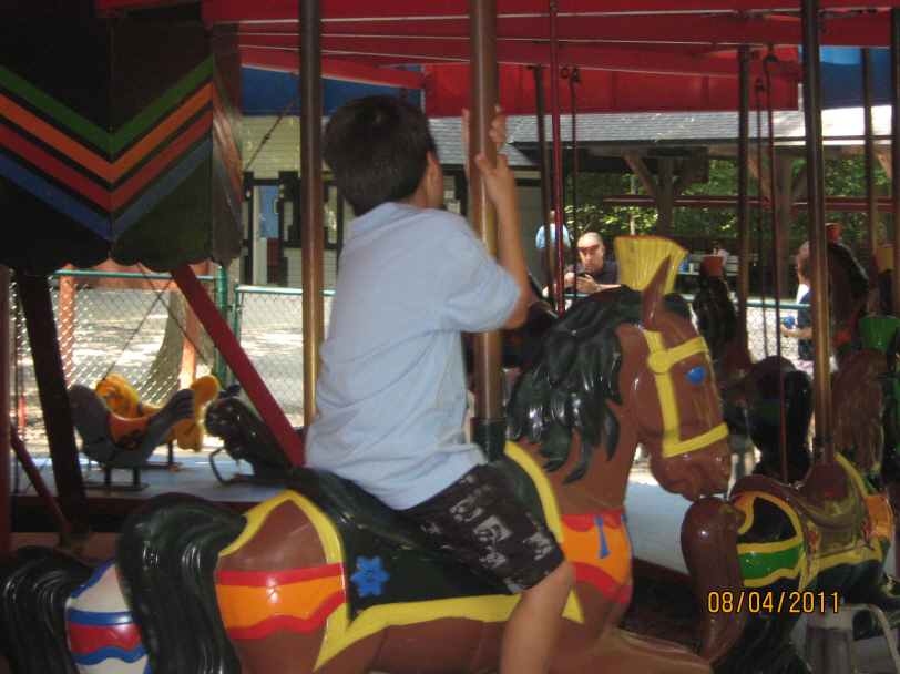 Photo Editor_110804r Josiah at Burke Lake Carousel.JPG : Aug 1 at Home Pool and Aug 4 at Burke Lake