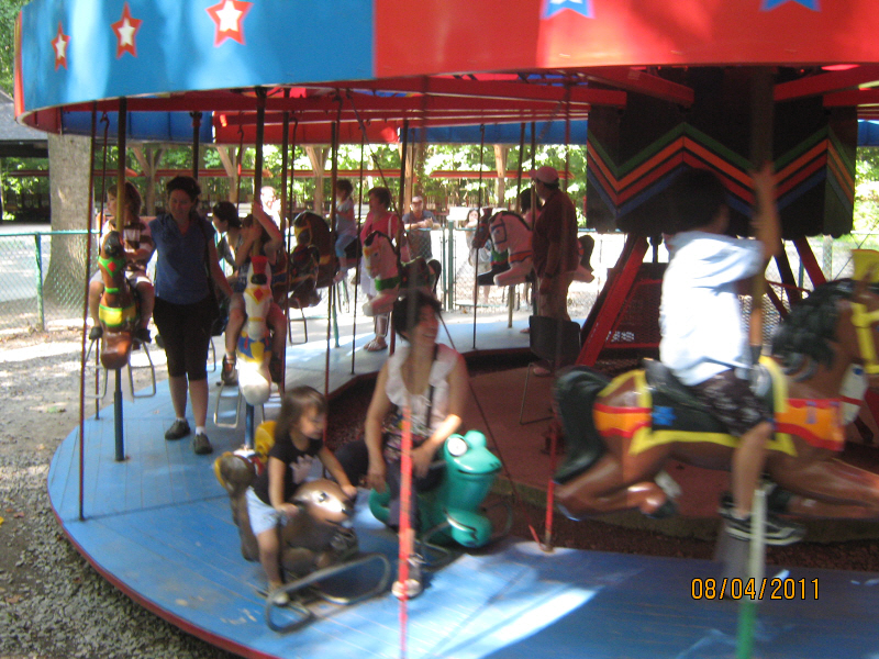 Photo Editor_110804l Karis n mj at Burke Lake Carousel.JPG : Aug 1 at Home Pool and Aug 4 at Burke Lake